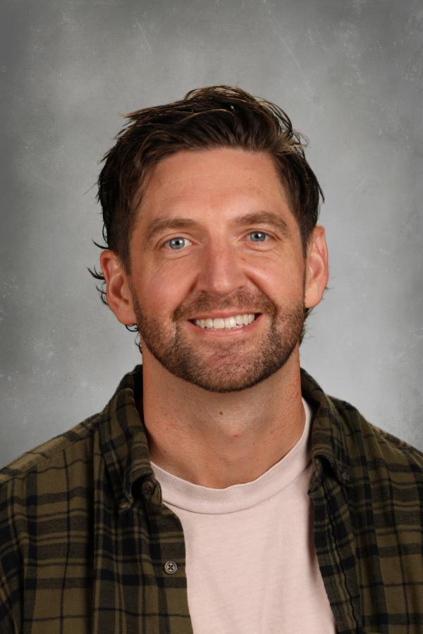 Headshot of Grant Lilly, Campus Pastor at New Life Academy